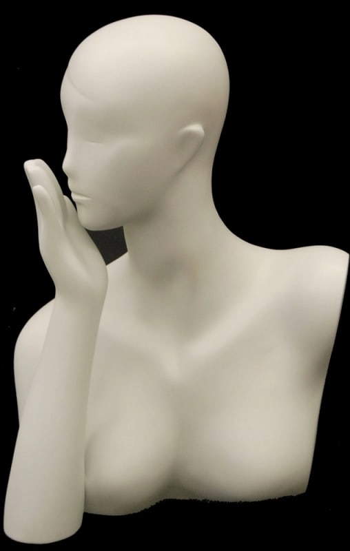Matte white abstract fiberglass head display in a blowing kiss pose for retail jewelry and accessory showcases.