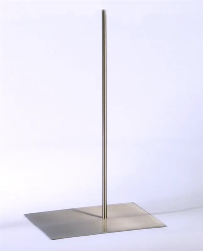 Brushed chrome offset pole base for mannequin display stand in modern retail use