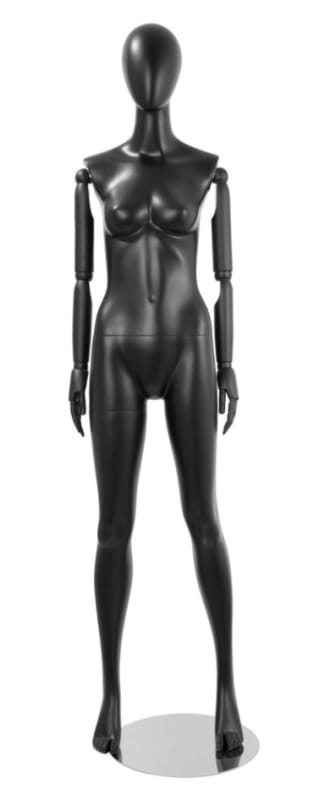 Black female egghead mannequin with posable wooden arms in a straight-leg standing pose Black female egghead mannequin with posable wooden arms in a straight-leg standing pose
