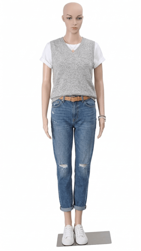 Unbreakable realistic fleshtone female mannequin with arms at sides standing on metal base