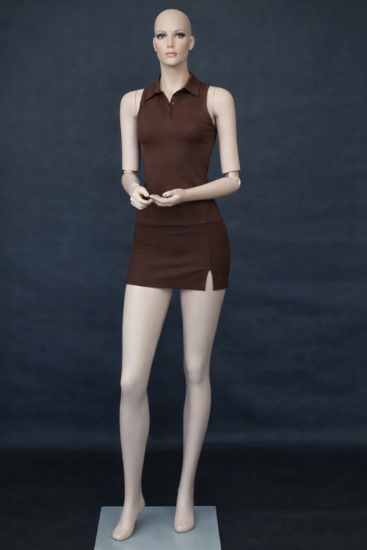 5'10" realistic female mannequin with posable elbows, hand-painted makeup, fiberglass construction, and tempered glass base