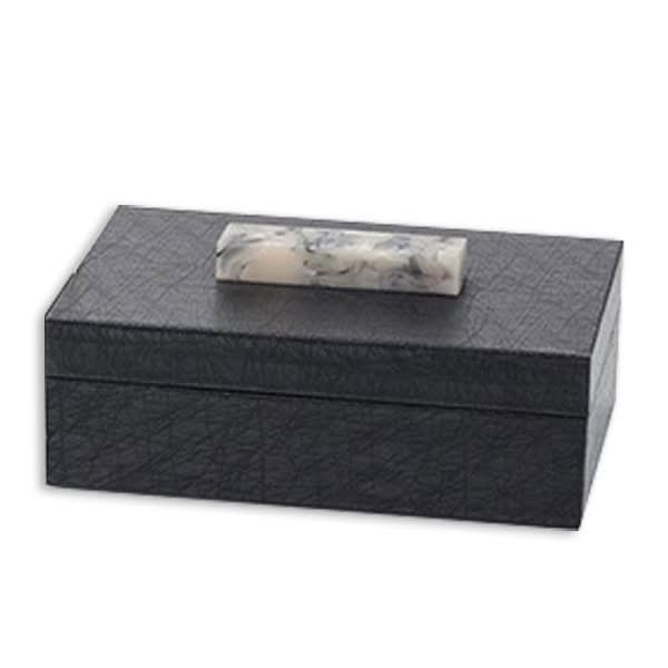 Small black resin decorative box with white sculptural handle