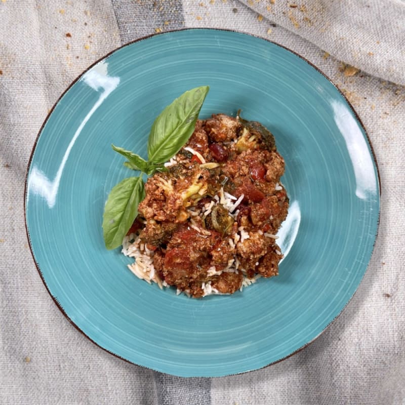 Marinated ground turkey, red kidney beans, broccoli, spinach, onions and peppers marinated deliciously over basmati rice.