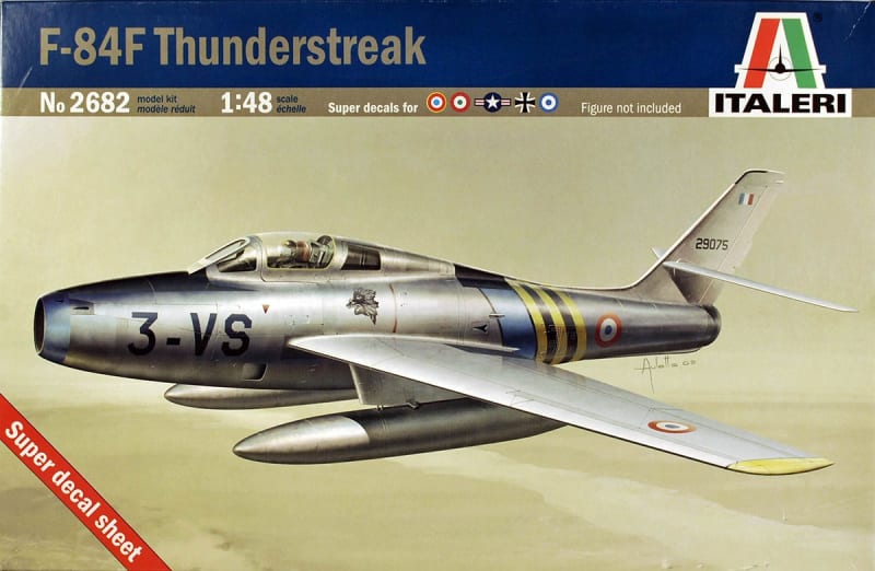 Box art of cold war F-84F Thunderstreak flying through mid air.