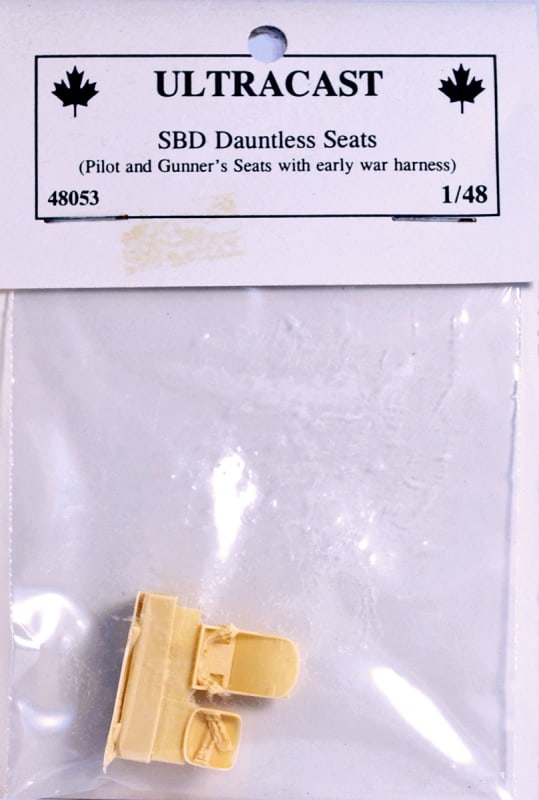 Photo of Ultracast resin pilot and gunner seats for scale model SBD Dauntless.