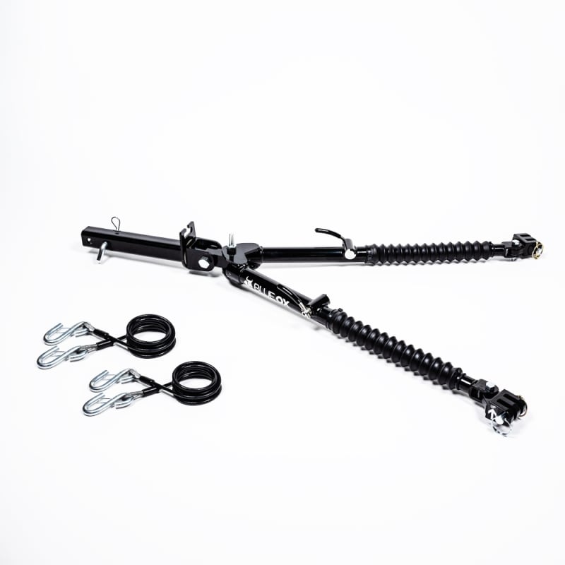 The Blue Ox Alpha 2 tow bar, model BX7390, is a Class III steel tow bar with a 8,500 lbs towing capacity, designed for flat towing a vehicle behind an RV. It is known for its user-friendly, non-binding design and self-aligning arms.