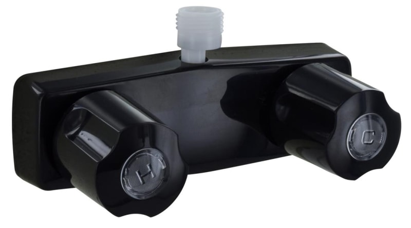 The Valterra PF213741 is a black plastic shower control valve with a vacuum breaker and knob handles, designed as a replacement for RV and travel trailer exterior showers.