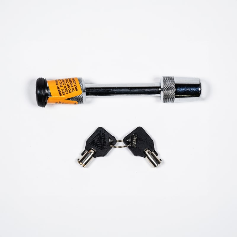 The Blue Ox BX8859 is a 1/2" locking pin designed to secure a Blue Ox tow bar to the vehicle's baseplate. It is made of hardened, chrome-plated steel and includes a watertight cap to protect against dirt and corrosion.