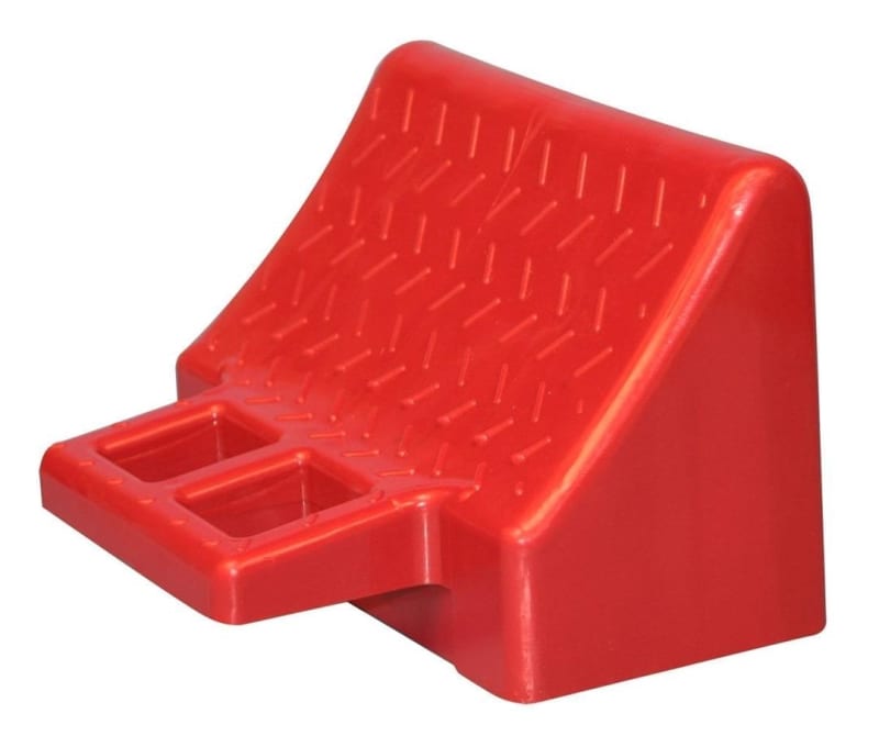 The Valterra Stackers wheel chock (A10-0922) is a plastic chock designed specifically to be used with the Valterra Stackers RV leveling block system. It interlocks with the leveling blocks to create a continuous ramp that stops the RV wheel securely.
