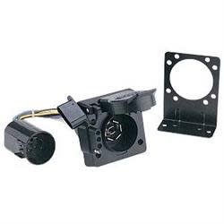 The Husky Towing 13092 7 & 4 Way Multi-Tow Adapter is a vehicle-end connector that provides both a 7-way RV blade and a 4-way flat wiring connection, typically used as a direct replacement for factory-installed sockets.