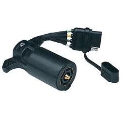 The Husky Towing 13170 7-Way Blade to 4-Flat Adapter, a plug-and-play adapter used to connect a vehicle with a 7-way round blade socket to a trailer with a 4-way flat plug.