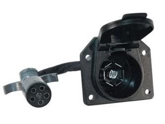 The Husky Towing 30693 Trailer Wiring Connector Adapter converts a vehicle's 6-pin round socket to a trailer's 7-way RV blade plug.