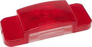 The Optronics AST61BP is a red, snap-on replacement tail light lens for the driver's side of RVST61 and RVSTL61 series trailer lights. It is made of acrylic.