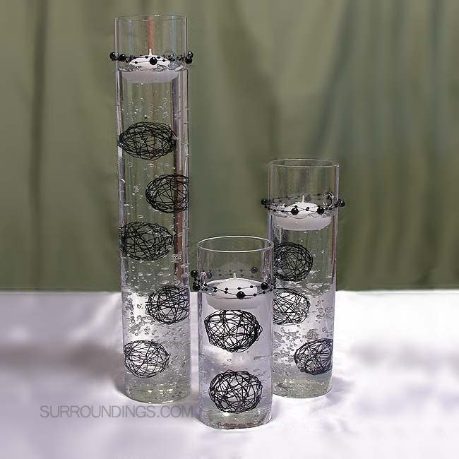 Cylinders cylinder set and black spheres floating candle centerpiece