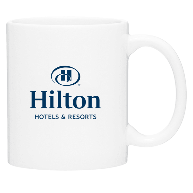 Hilton 11-ounce C-handle white ceramic coffee mug with blue Hilton logo.