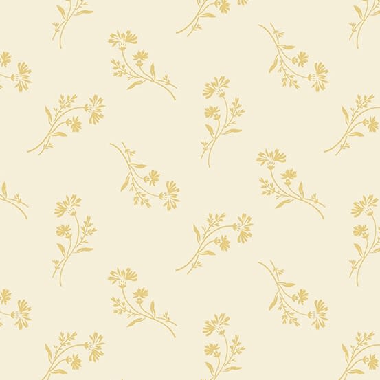 This shows a floral sprig in topaz tan  on a cream ground.