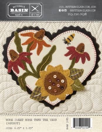 Home Sweet Home Thru the Year AUGUST WOOL MAT PATTERN from Buttermilk Basin depicts sunflowers and cone flowers.