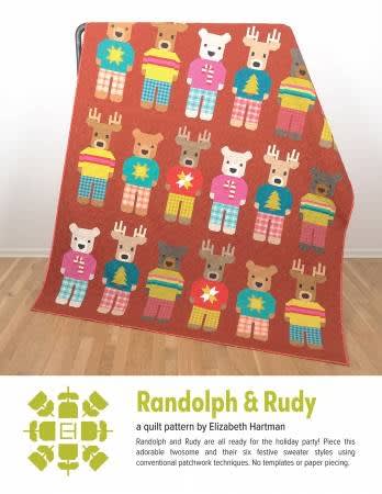 Randolph & Rudy Reindeer Quilt Pattern by Elizabeth Hartman shows a quilt with standing tall reindeers in sweaters.