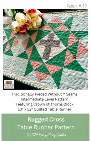 Rugged Cross Quilted Table Runner Pattern  shows a close up of the quilted rugged cross quilt block in green and pink with a cross in the center.