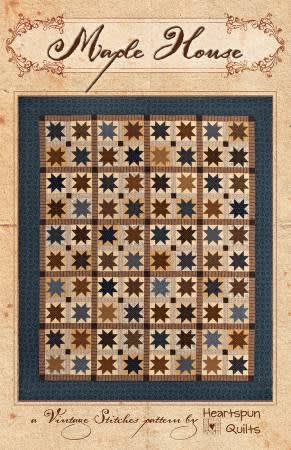 Maple House Quilt Pattern by Heartspun Quilts shows a traditional quilt in many colors on a LIGHT background.