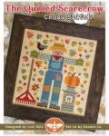 The Quilted Scarecrow CROSS STITCH Pattern from It's Sew Emma shows a scarecrow and fall iconagraphy such as a pumpkin, crows, and falling leaves in a multi-color design for stitching in cross stitch.