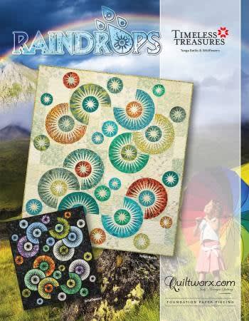 Raindrops Quilt Pattern by Judy Niemeyershows a multicolored starburst quilt with a dark and with a light background color.