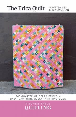 The Erica Quilt Pattern by Kitchen Table Quiltingshows a quilt with a diagonal quilt set of colorfuly pieced blocks.