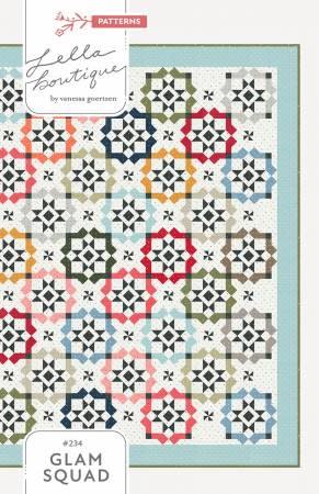 Glam Squad Quilt Pattern from Lella Boutique shows a scrap quilt of multi-colored star blocks each with a unique frame around them.