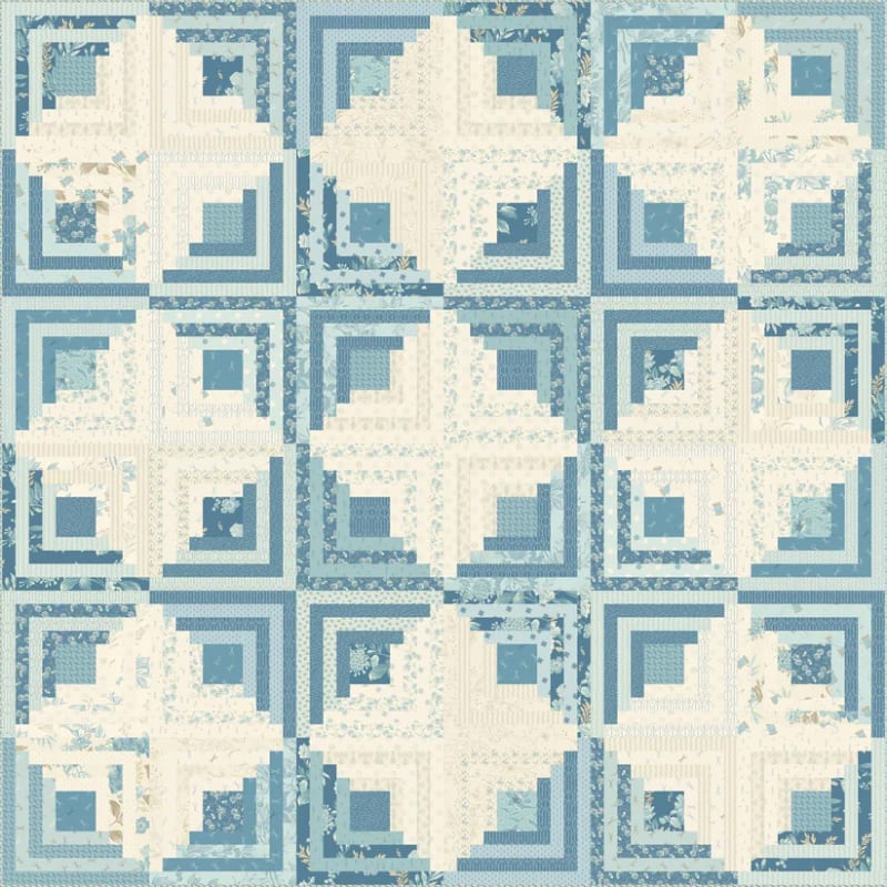 SEWING BIRD: Quilter's Cabin Quilt Pattern by Laundry Basket Quilts shows a traditional log cabin quilt set in tones of cream, and blues..