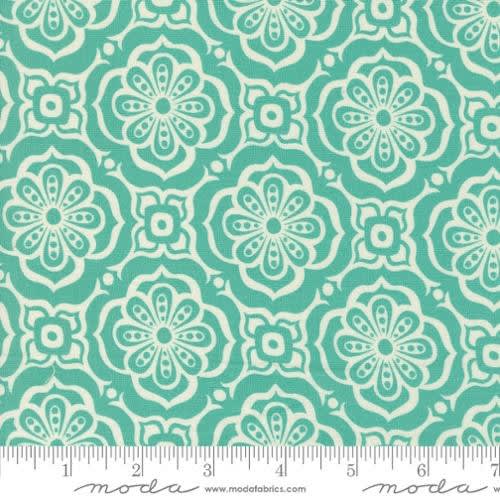 Tango Alhambra Sea Blue 27333-23  shows a tile pattern with a flower inside of diagonally set tiles with a lattice of small flowers in-between in blue.