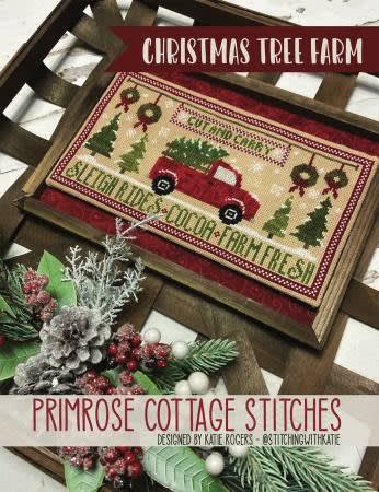 Christmas Tree Farm Cross Stitch Pattern  from Primrose Cottage Stitches shows a red car and Christmas trees in a holiday Christmas cross stitch sampler, and Christmas wreaths to deck out your home for the holidays.