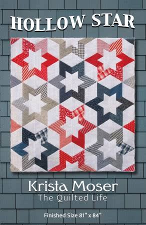 Hollow Star Quilt Pattern by Krista Moser shows a red, white and blue large graphic star quilt.