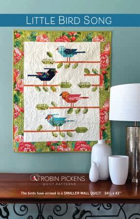 Little Bird Song Quilt Patternby Robin Pickens shows a fall wall hanging featuring 4 Acorns and shows the quilt made with a dark background as well as one made with a light background.