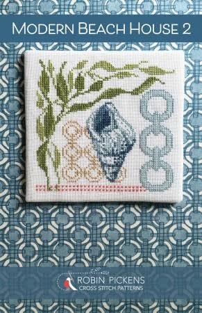 MODERN BEACHHOUSE 2 Cross Stitch Pattern shows a modern coastal beach design witha shell and seaweed and graphic rings.
