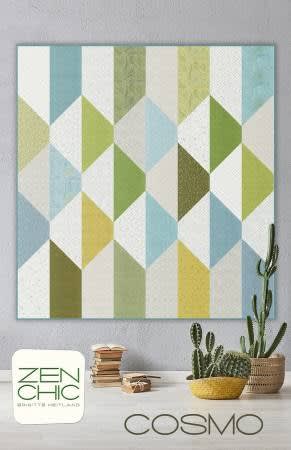 COSMO Quilt Pattern by Zen Chic shows a simple quilt , with straight lines and not much piecing, in shades of olive, blue and cream.