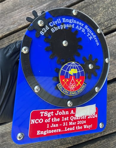 Gear Turning Logo Plaque