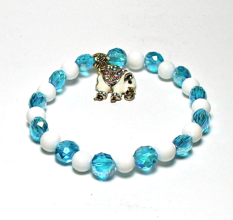 CB-10  STONE 8mm ROUND CRYSTAL BEAD BRACELET IN ELEPHANT  DESIGN-7 1/2"