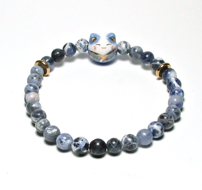 SB6-002-6mm STONE ROUND BEAD BRACELET IN BLUE CAT DESIGN -7 1/2"