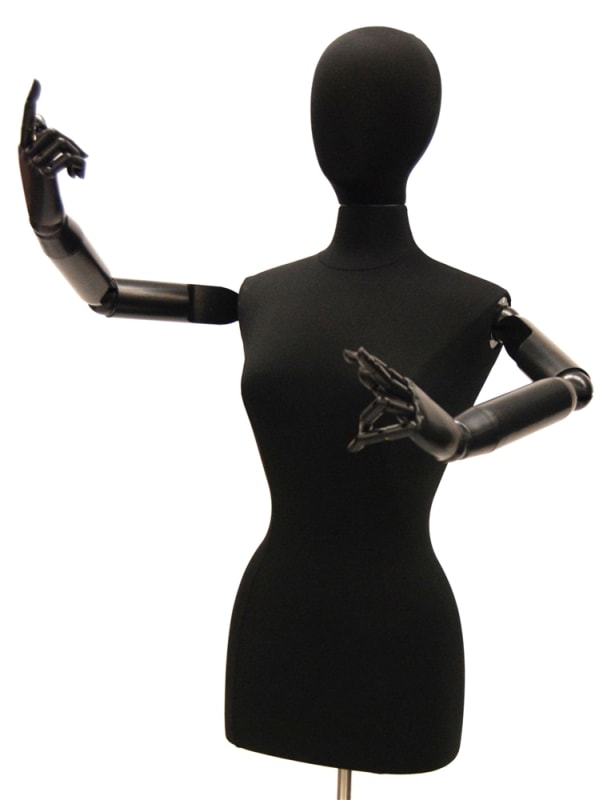 Female dress form in black jersey fabric with beachwood-colored flexible arms and a height-adjustable chrome rolling caster base.