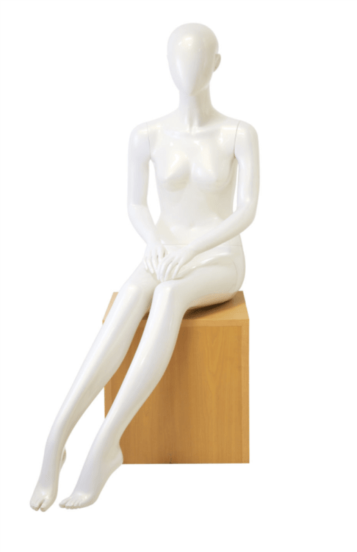 Pearl white abstract head female mannequin in seated pose with removable limbs for fashion retail display