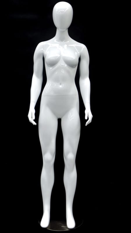Glossy white petite female mannequin made of fiberglass in a straight-on pose with a round metal base.