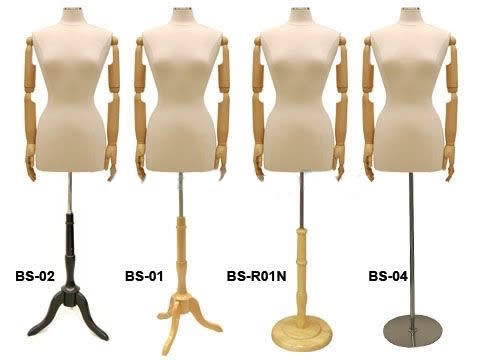 Flexible female dress form in tan jersey fabric with posable plastic arms and a chrome roller caster base. Flexible female dress form in tan jersey fabric with posable plastic arms and a chrome roller caster base.