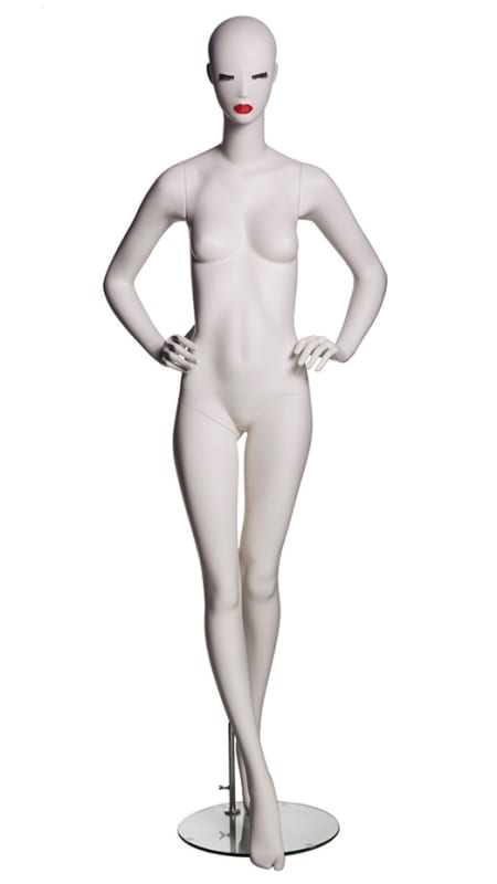 Female abstract mannequin in silky matte cream fiberglass with red lips and a round glass base in a hands-on-hips pose.