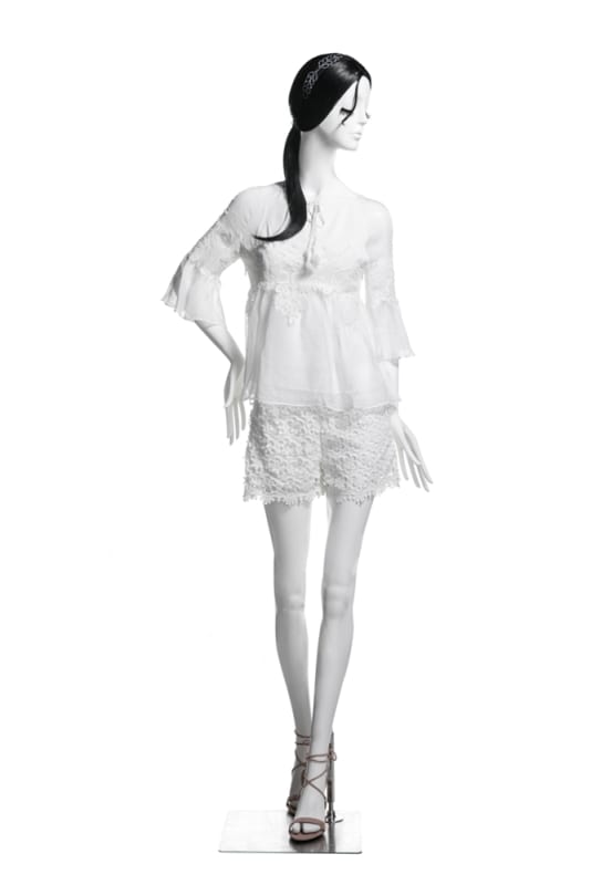 Female abstract mannequin in standing pose with bent arm, matte white fiberglass finish – ideal for fashion retail and boutique display