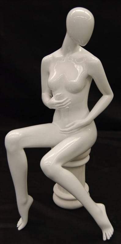 Seated egghead female white mannequin for retail clothing display and fashion merchandising