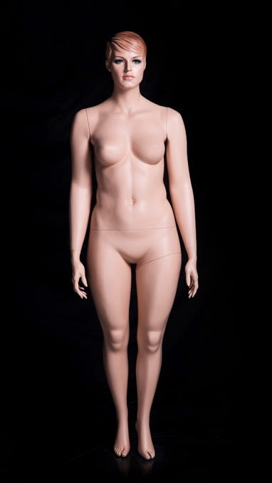 Plus-size female fiberglass mannequin in flesh tone with molded hair and metal base for retail clothing display.
