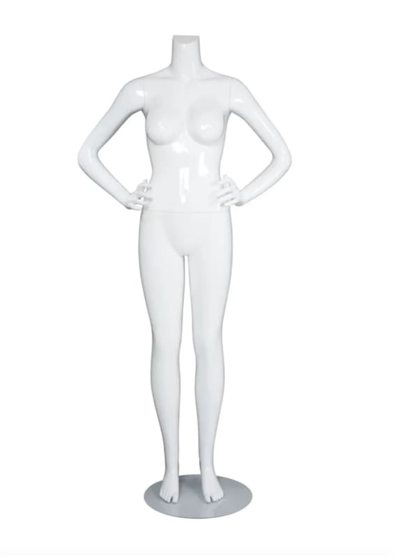 Female Brazilian mannequin with glossy white fiberglass finish, headless changeable head design, hands on hips pose, and included base.