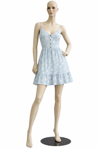 Female mannequin with detailed makeup and hand-on-hip pose in a neutral-tone finish.