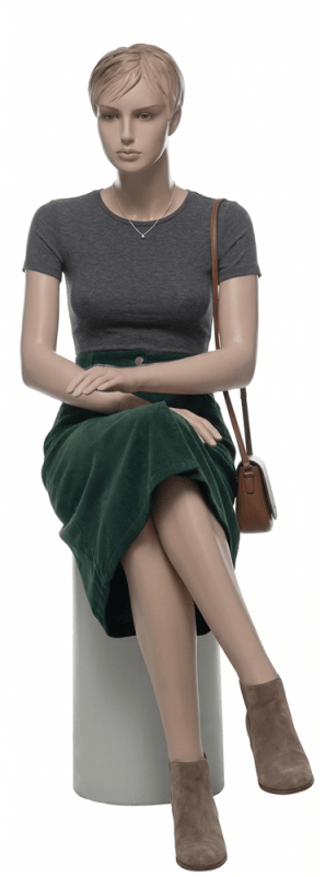 Seated realistic female mannequin with molded hair, light flesh tone finish, and hand-painted facial features for apparel displays