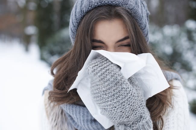 woman suffering from winter allergies